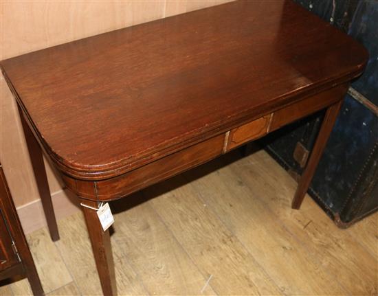 A George mahogany games table, the inner surfaces with chess and backgammon boards, W.95cm
